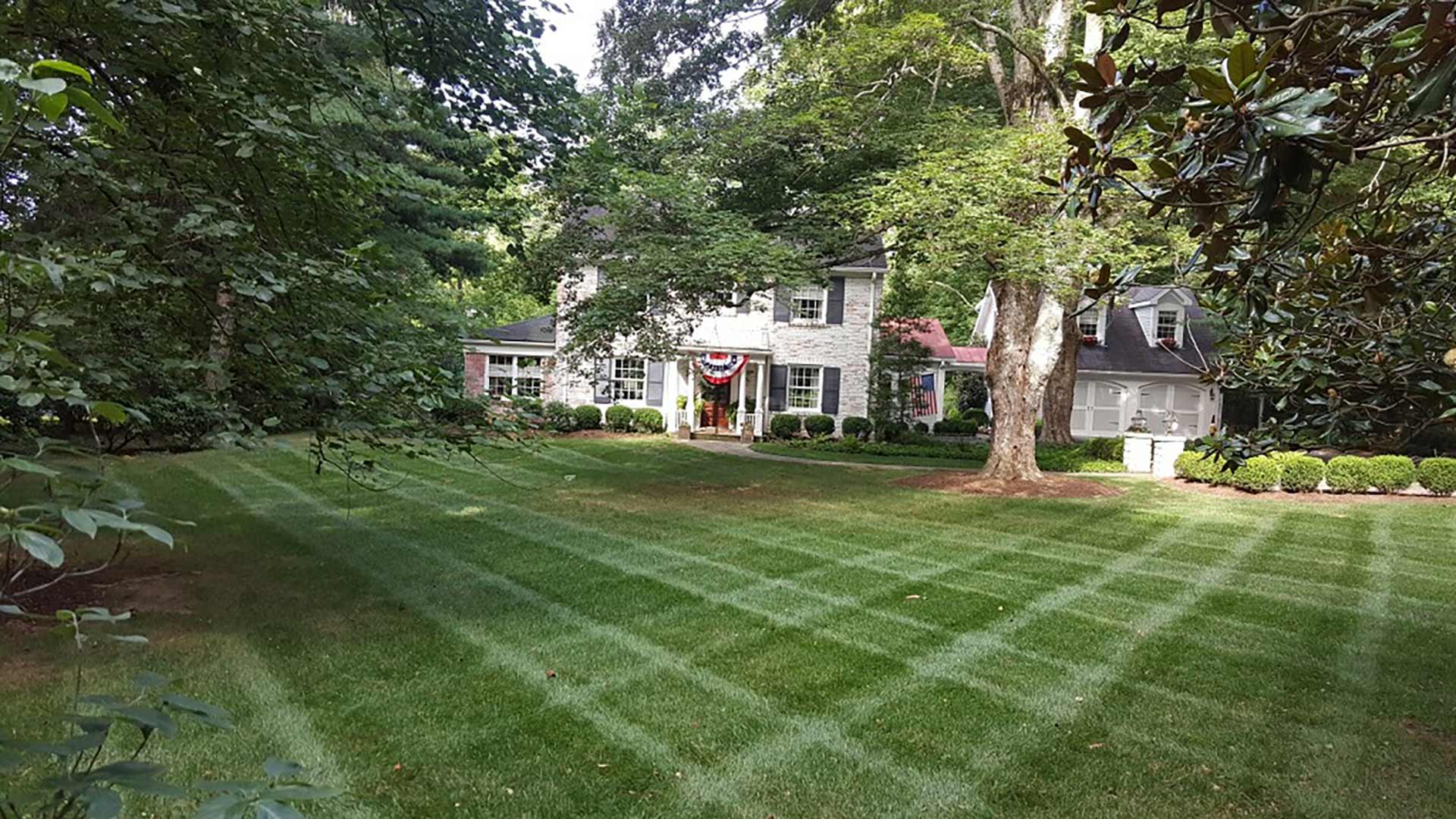 Mowed lawn with patterns added in Utica, IN.