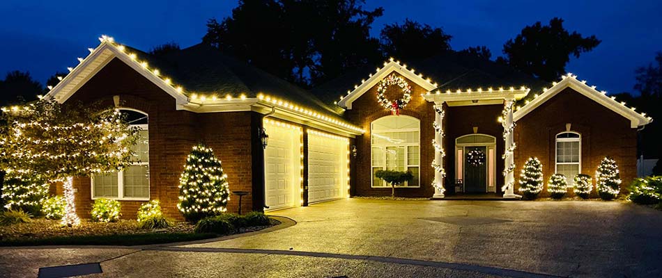 Christmas lights installed on a home and yard in Sellersburg, IN.