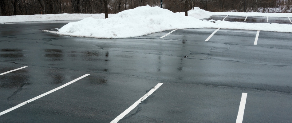 Commercial parking lot cleared of snow from snow plow removal service in Lyndon, KY.