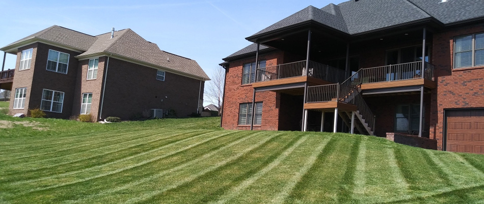 Hillside of a lawn shown with owing patterns in Watson, IN.