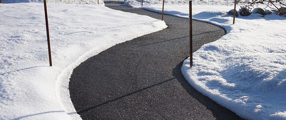 A pathway freshly cleared of snow on a commercial property in Anchorage, KY.